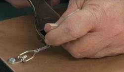 Back of framed artwork showing the required secure wire for hanging