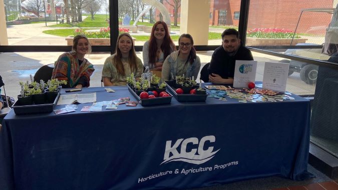 Five students at the Horticulture Clubs table at club rush