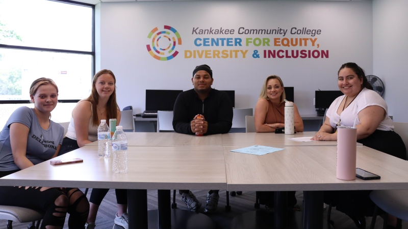 A snacks and chats session with 3 students alongside Kendra Souligne of Financial Aid and Melany Villagomez in the EDI Center sitting at a table