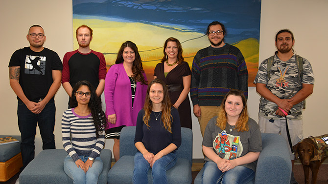 Nine students and a services dog from the Psychology Club